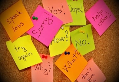 bulletin board with sticky notes