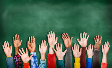 group of raised hands - ThinkstockPhotos-522259145